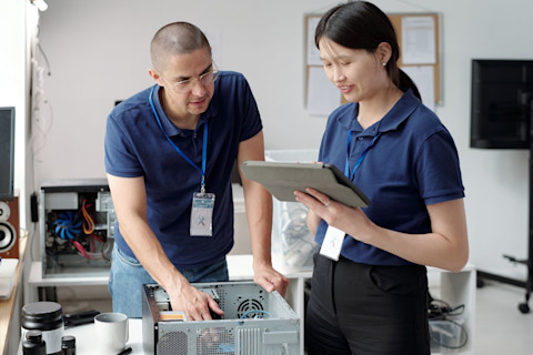 Discussing Computer Repair Solutions in Office Setting