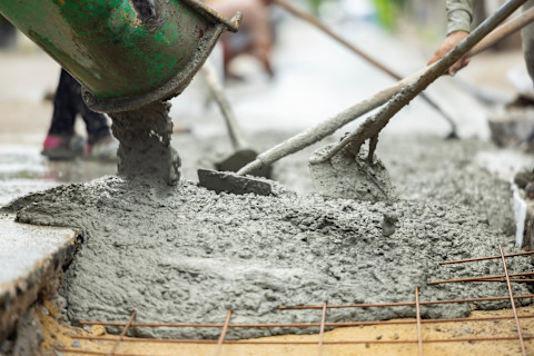 concrete being poured by contractors
