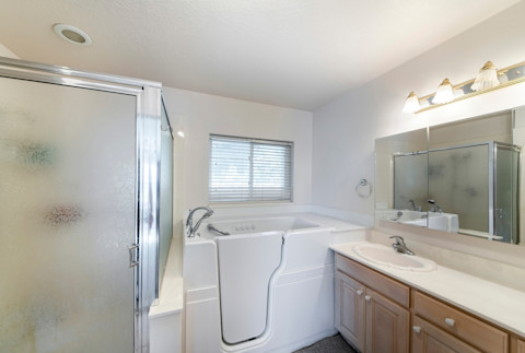 Square Walk-in bathtub with elderly and handicapped accessibility.